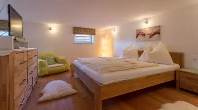 Ein Bett oder Betten in einem Zimmer der Unterkunft Apartments Harreiter