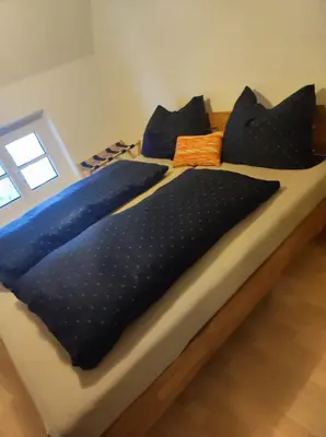 Ein Bett oder Betten in einem Zimmer der Unterkunft ZENTRALE LAGE - Top 5