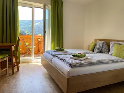 Ein Bett oder Betten in einem Zimmer der Unterkunft Haus Filzmoos