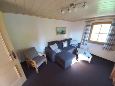 Ein Sitzbereich in der Unterkunft Waldherrhof