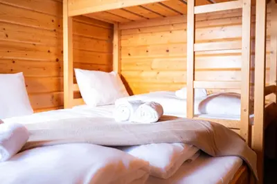 Ein Bett oder Betten in einem Zimmer der Unterkunft Edelweiß Gästehaus Lachtal