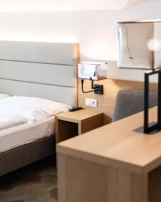 Ein Bett oder Betten in einem Zimmer der Unterkunft Hotel Matteo