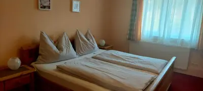 Ein Bett oder Betten in einem Zimmer der Unterkunft Ferienhaus Reith
