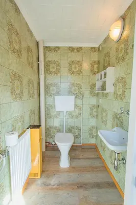 Ein Badezimmer in der Unterkunft Hoamathaus by Alpenidyll Apartments