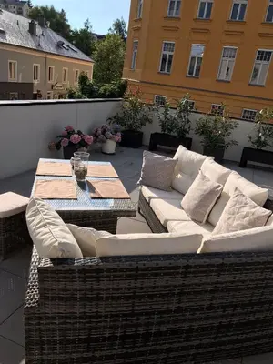 Ein Sitzbereich in der Unterkunft Ferienwohnung Gmunden City
