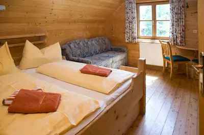 Ein Bett oder Betten in einem Zimmer der Unterkunft Galsterbergalm Jagdhütte