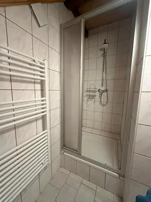 Ein Badezimmer in der Unterkunft Ferienhaus Werkstattl Rassis Feriendorf Donnersbachwald
