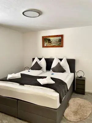 Ein Bett oder Betten in einem Zimmer der Unterkunft My Appartements