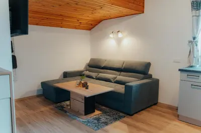 Ein Sitzbereich in der Unterkunft Bergblickapartments