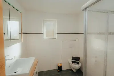 Ein Badezimmer in der Unterkunft Bergblickapartments