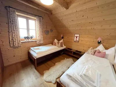 Ein Bett oder Betten in einem Zimmer der Unterkunft Holiday Home st martin chalets-2 by Interhome