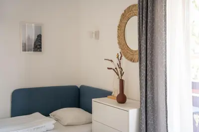 Ein Bett oder Betten in einem Zimmer der Unterkunft Nada Apartman