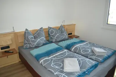 Ein Bett oder Betten in einem Zimmer der Unterkunft Apartment Ausblick