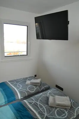 Ein Bett oder Betten in einem Zimmer der Unterkunft Apartment Ausblick