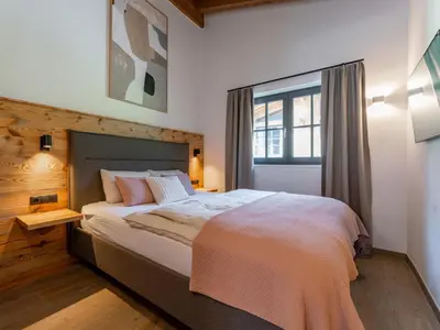 Ein Bett oder Betten in einem Zimmer der Unterkunft Wagrainer TauernLodge 42B