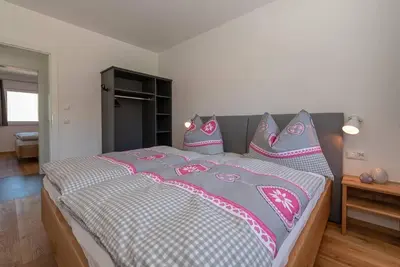 Ein Bett oder Betten in einem Zimmer der Unterkunft Appartement Tannenhof III