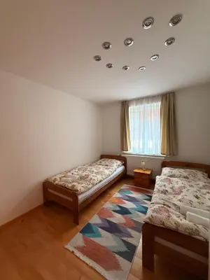 Ein Bett oder Betten in einem Zimmer der Unterkunft Wohnung in Hüttau
