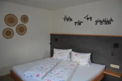 Ein Bett oder Betten in einem Zimmer der Unterkunft Appart Weisse Urlauben am Wolfgangsee