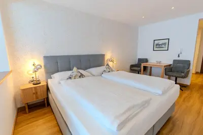 Ein Bett oder Betten in einem Zimmer der Unterkunft Appartementhaus Christophorus