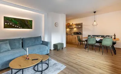 Ein Sitzbereich in der Unterkunft Appartements Uribi mit eigener Sauna by Schladmingurlaub