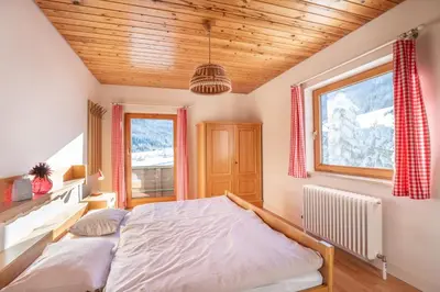 Ein Bett oder Betten in einem Zimmer der Unterkunft Appartementhaus Schmalzermoos