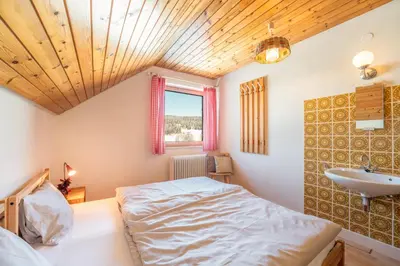 Ein Bett oder Betten in einem Zimmer der Unterkunft Appartementhaus Schmalzermoos