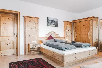 Ein Bett oder Betten in einem Zimmer der Unterkunft Landhaus Stieglschuster, middle of 5-Skiarea & mountain view 360