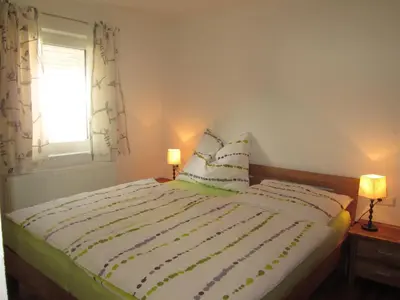Ein Bett oder Betten in einem Zimmer der Unterkunft Haus Steinbrecher Hallstatt