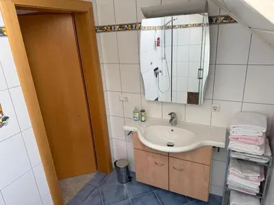 Ein Badezimmer in der Unterkunft dastraunseehaus