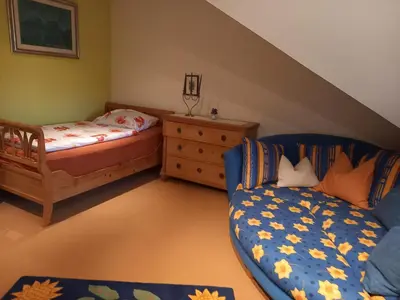 Ein Bett oder Betten in einem Zimmer der Unterkunft Ferienhaus am Mondsee