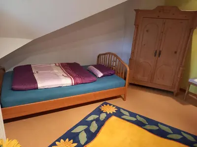 Ein Bett oder Betten in einem Zimmer der Unterkunft Ferienhaus am Mondsee