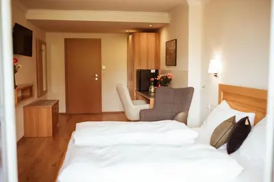 Ein Bett oder Betten in einem Zimmer der Unterkunft Rudolfshöhe