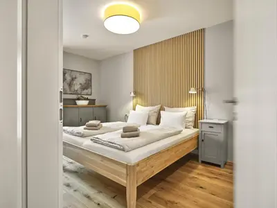 Ein Bett oder Betten in einem Zimmer der Unterkunft The Tauplitz Suites - Alpine Suite B4 by AA Holiday Homes
