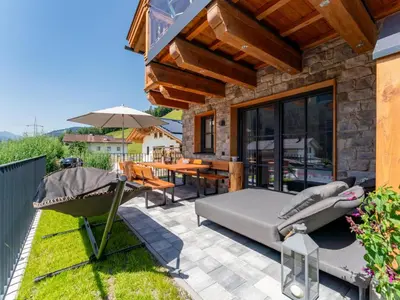 Ein Garten an der Unterkunft Wagrainer TauernLodge 42C