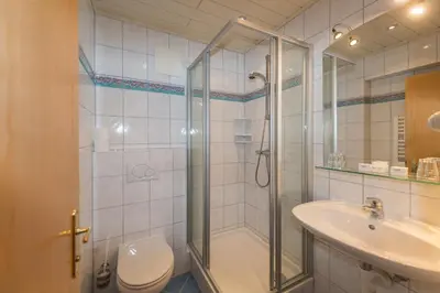 Ein Badezimmer in der Unterkunft Blasbichlerhof