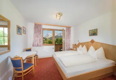 Ein Bett oder Betten in einem Zimmer der Unterkunft Blasbichlerhof