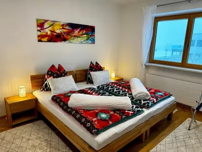 Ein Bett oder Betten in einem Zimmer der Unterkunft Haus Grimm - Apartment Katharina