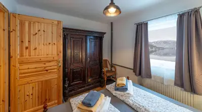 Ein Bett oder Betten in einem Zimmer der Unterkunft Ferienwohnung Haus Sonnenschein