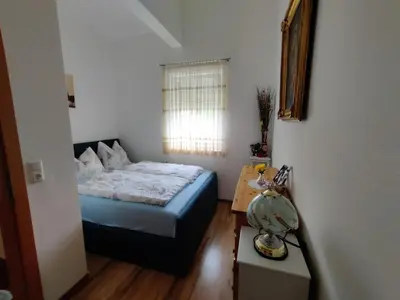 Ein Bett oder Betten in einem Zimmer der Unterkunft Bungalow Lindenweg