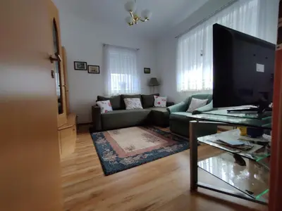 Ein Sitzbereich in der Unterkunft Bungalow Lindenweg