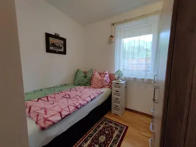 Ein Bett oder Betten in einem Zimmer der Unterkunft Bungalow Lindenweg