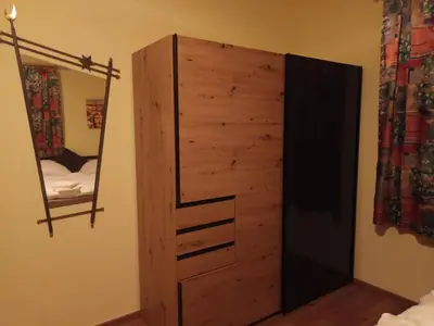 Ein Bett oder Betten in einem Zimmer der Unterkunft Zimmer Kropfmoar
