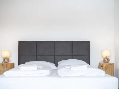Ein Bett oder Betten in einem Zimmer der Unterkunft Lärchenhof Top 202