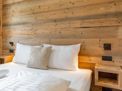 Ein Bett oder Betten in einem Zimmer der Unterkunft Wagrainer TauernLodge 42A