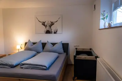 Ein Bett oder Betten in einem Zimmer der Unterkunft Appartement Ausblick