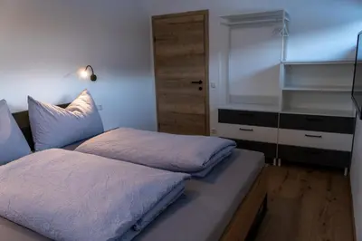 Ein Bett oder Betten in einem Zimmer der Unterkunft Appartement Ausblick