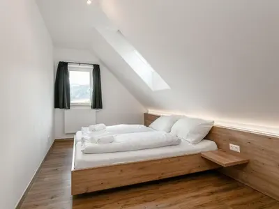 Ein Bett oder Betten in einem Zimmer der Unterkunft NRV Top 567 XL