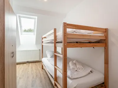 Ein Bett oder Betten in einem Zimmer der Unterkunft NRV Top 567 XL