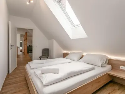 Ein Bett oder Betten in einem Zimmer der Unterkunft NRV Top 7