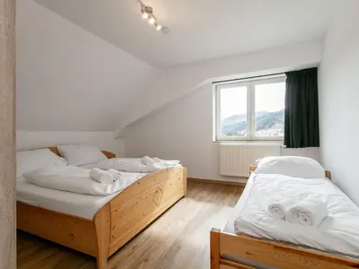 Ein Bett oder Betten in einem Zimmer der Unterkunft NRV Top 5